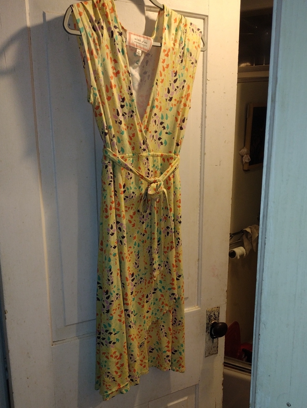 More Of me.  Sleeveless Yellow Floral Wrap Dress with Tie Waist